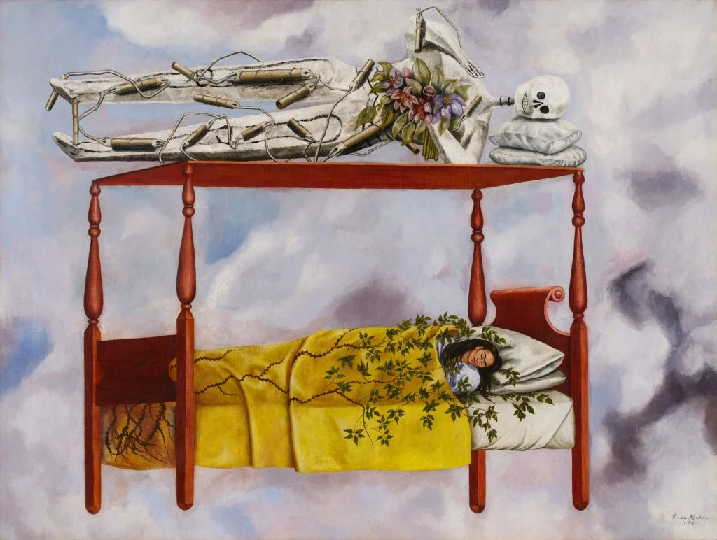A painting by Frida Kahlo shows the artist in a four-poster bed floating in the sky, while atop the bed lies a white figure with a skull for a head, holding a bouquet of flowers